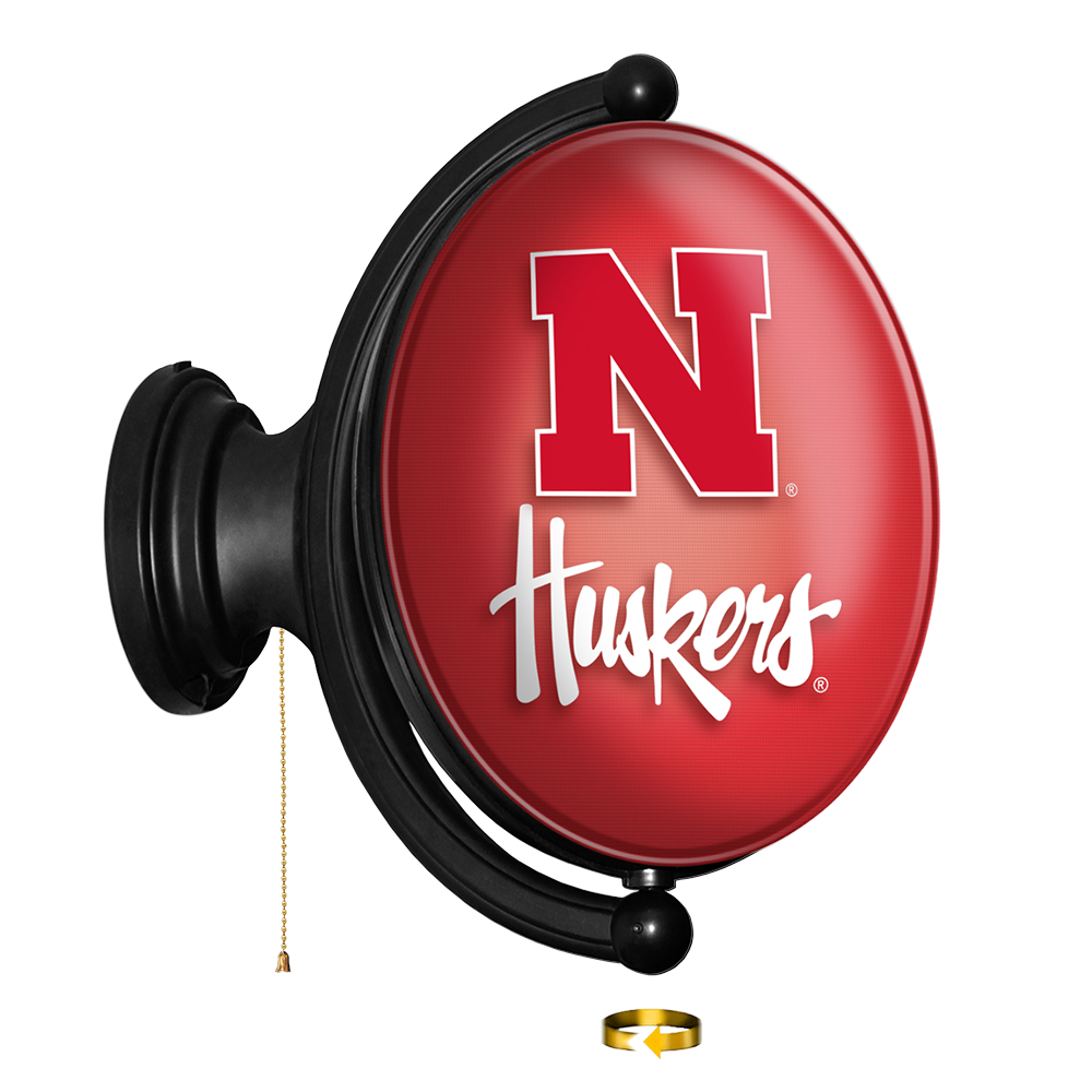 Nebraska Cornhuskers: Original Oval Rotating Lighted Wall Sign