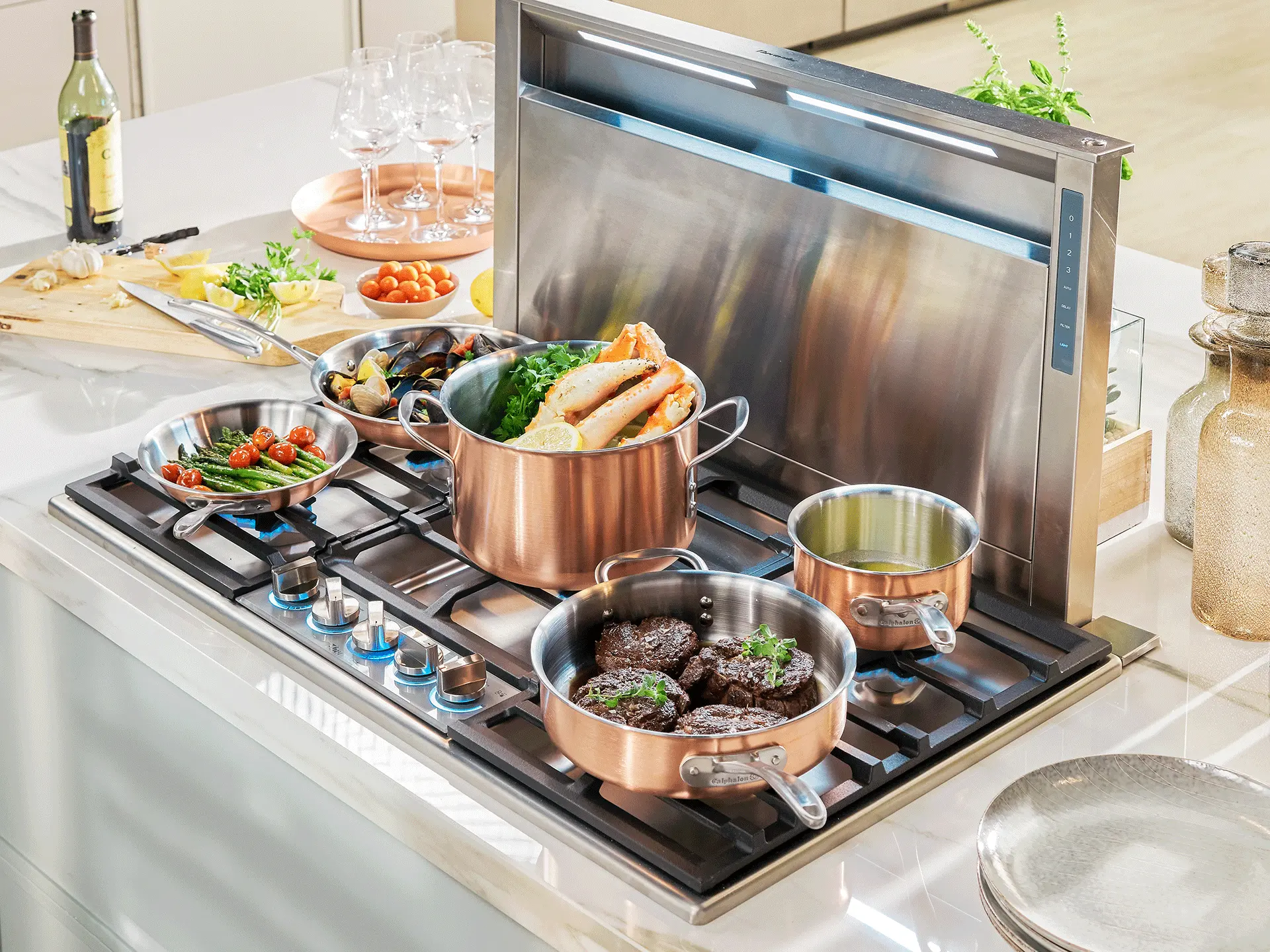 Parrilla de gas Thermador de la colección Masterpiece® con ollas sobre quemadores Star®, disponible a través de Artexa México