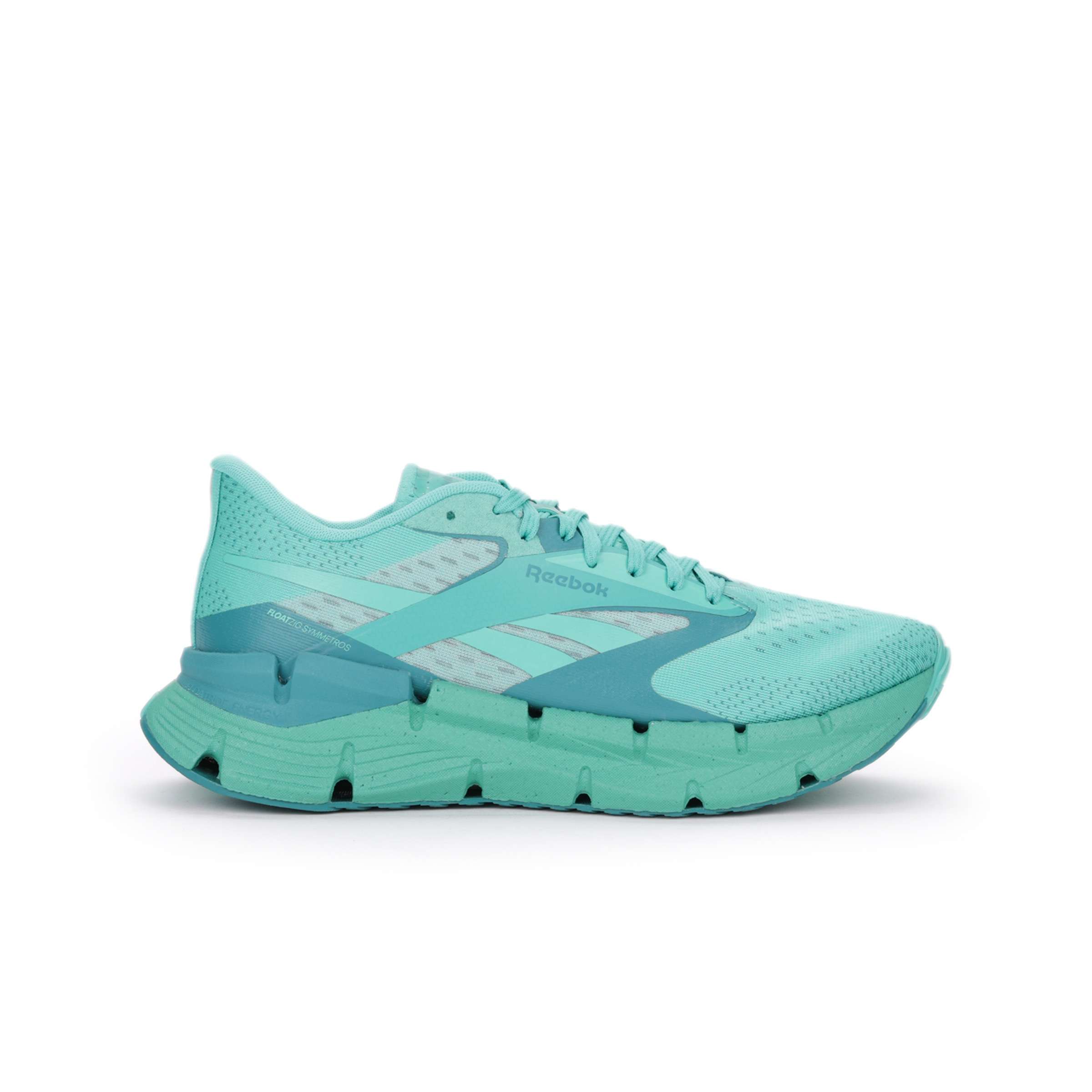 Los tenis Floatzig Symmetros Reebok con espuma Floatride Energy Foam que proporciona ligereza y retorno de energía.