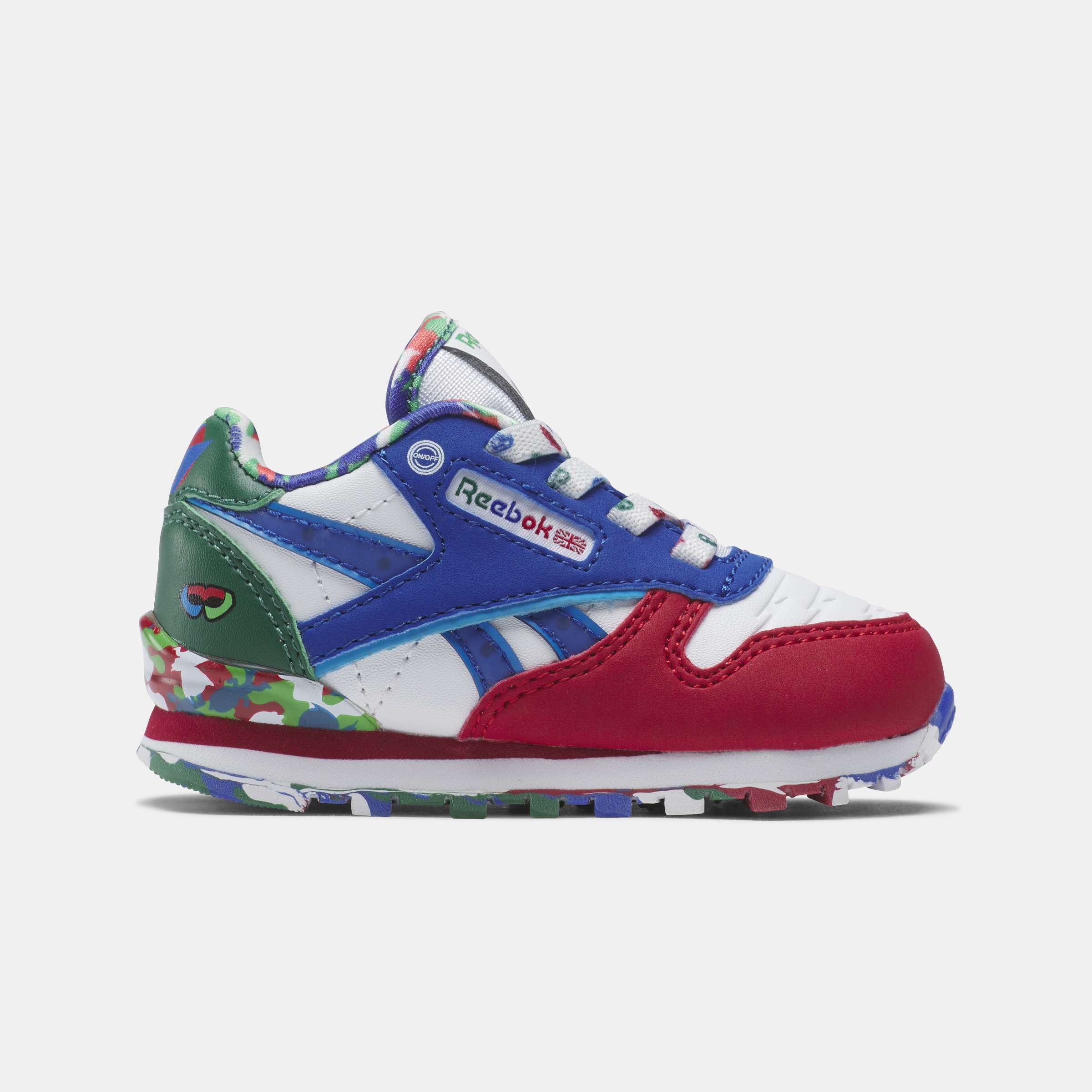 Los tenis Reebok para niños pequeños cuentan con colores y detalles divertidos, y tienen clips en el talón que se iluminan con cada paso. image number 0