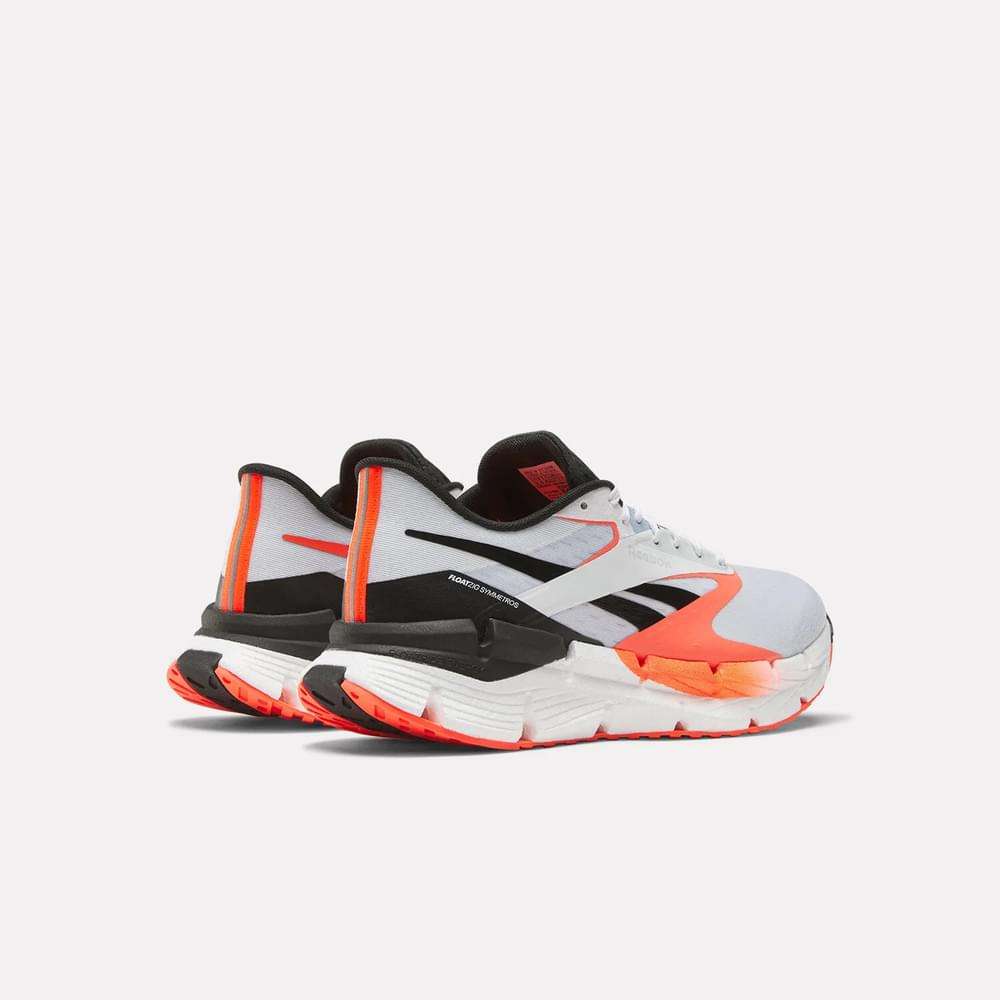 Los tenis Floatzig Symmetros Reebok con espuma Floatride Energy Foam que proporciona ligereza y retorno de energía.