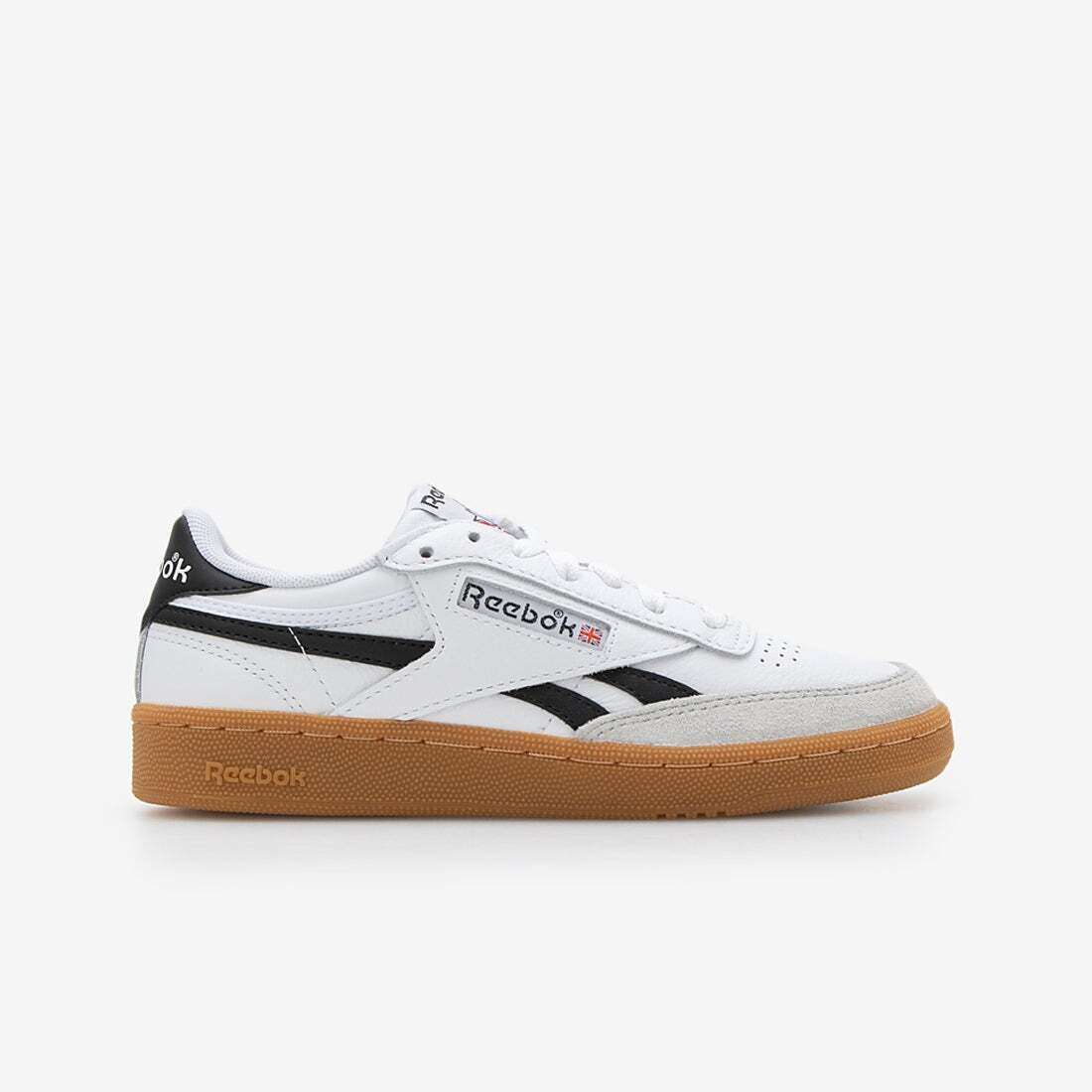 Tenis casuales inspirados en los años 80, con parte superior de cuero suave y rayas laterales de contraste.