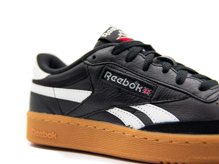 Tenis casuales inspirados en los años 80, con parte superior de cuero suave y rayas laterales de contraste. image number 8
