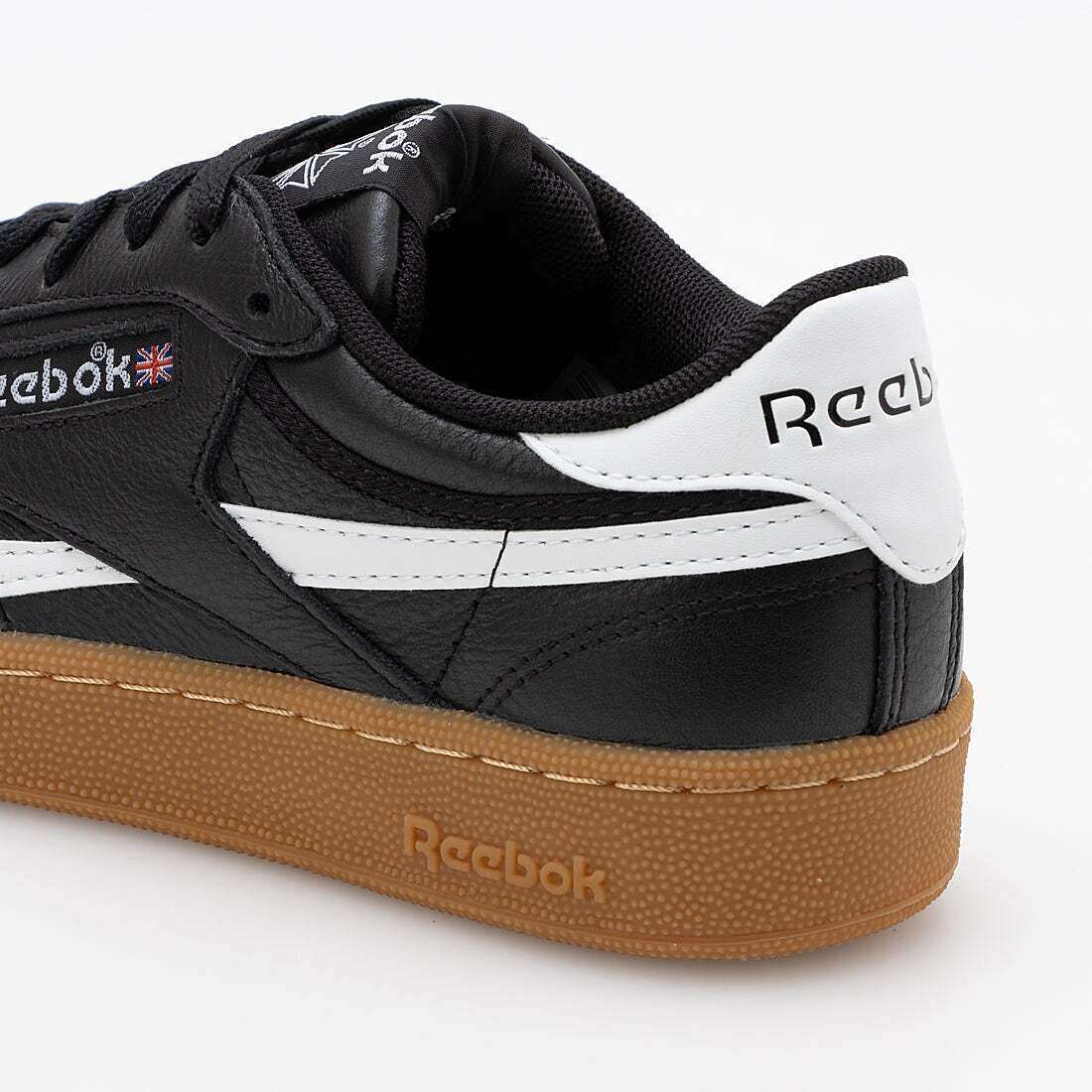Tenis casuales inspirados en los años 80, con parte superior de cuero suave y rayas laterales de contraste. image number 9