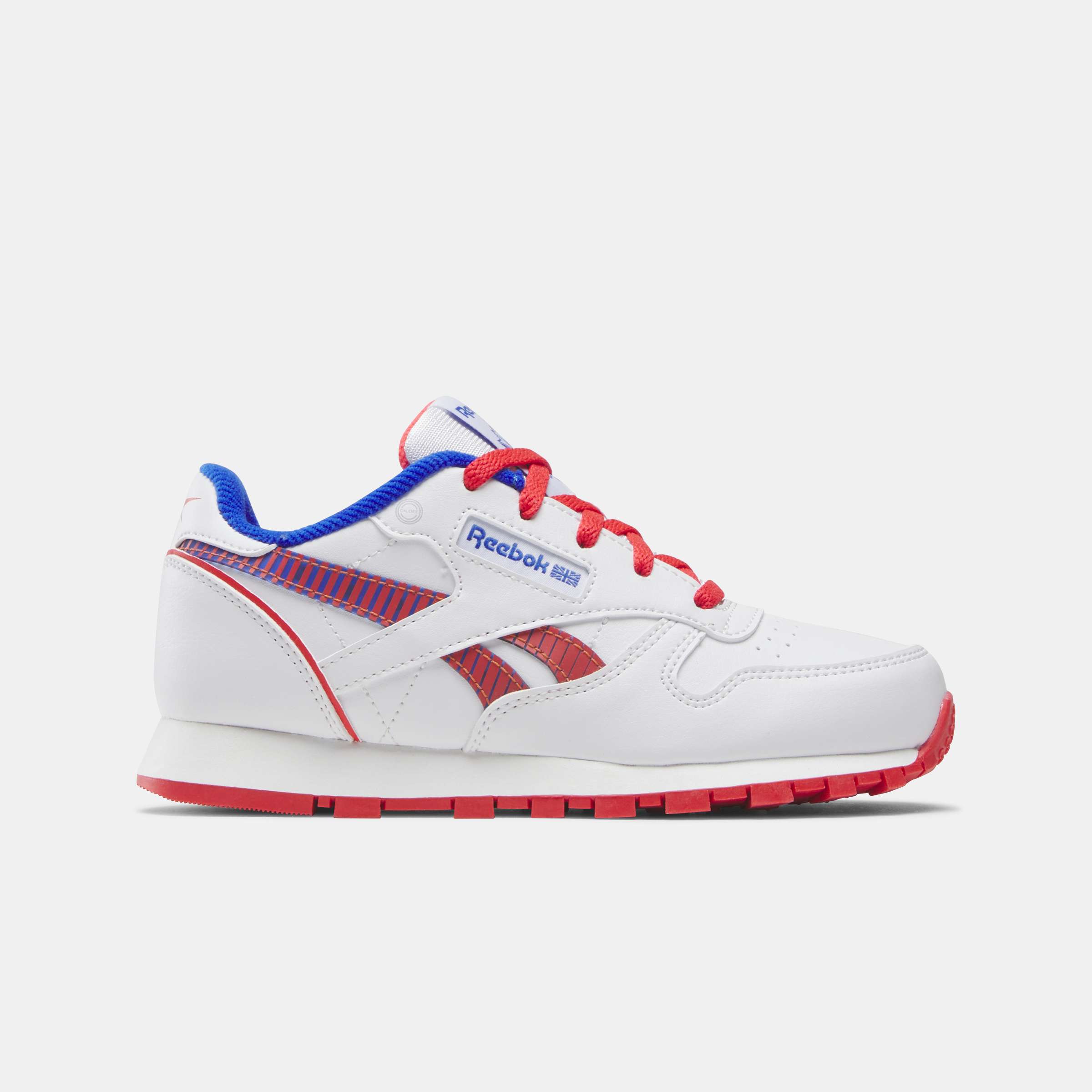 Los tenis Reebok para niños pequeños cuentan con colores y detalles divertidos, y tienen clips en el talón que se iluminan con cada paso. image number 0