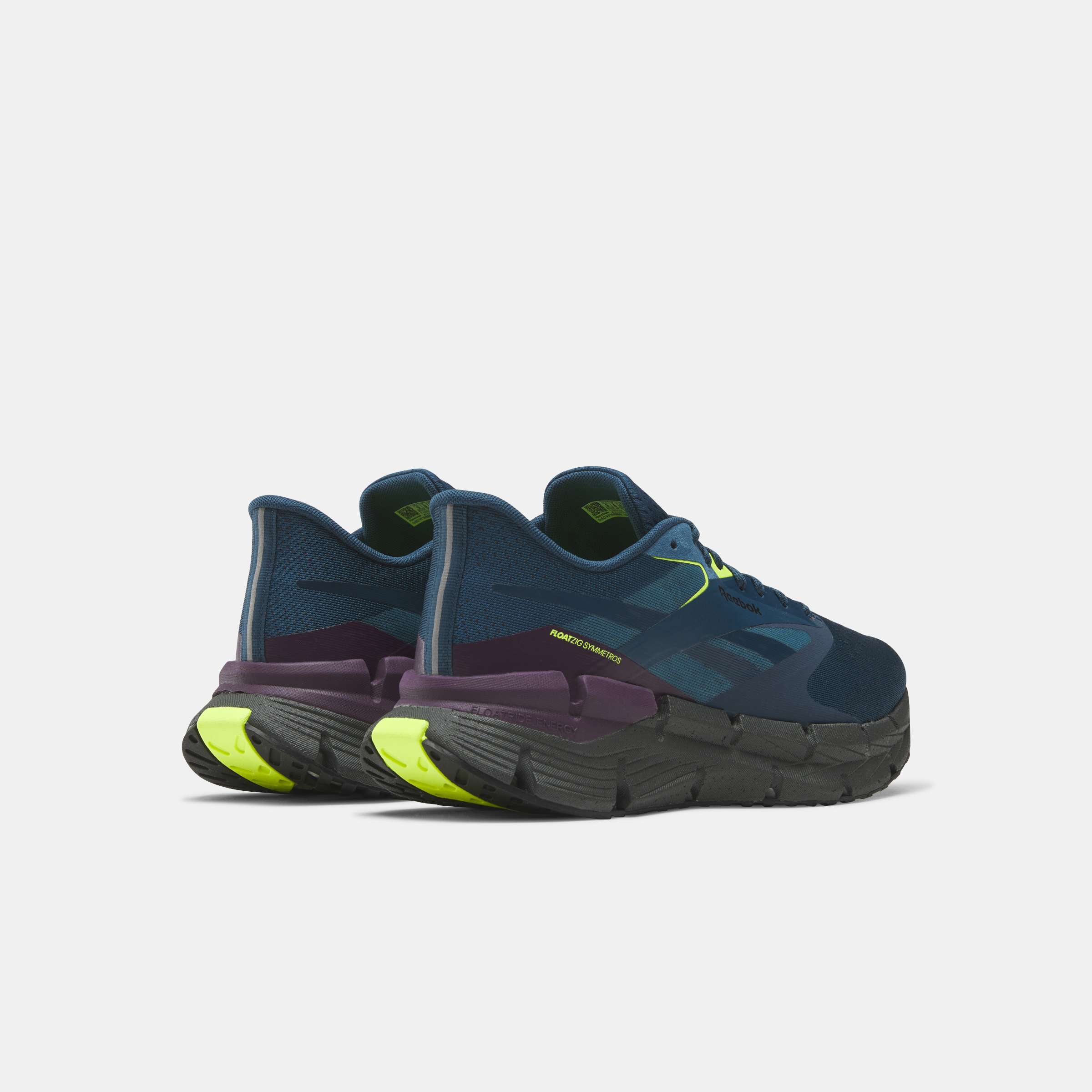 Los tenis Floatzig Symmetros Reebok con espuma Floatride Energy Foam que proporciona ligereza y retorno de energía.