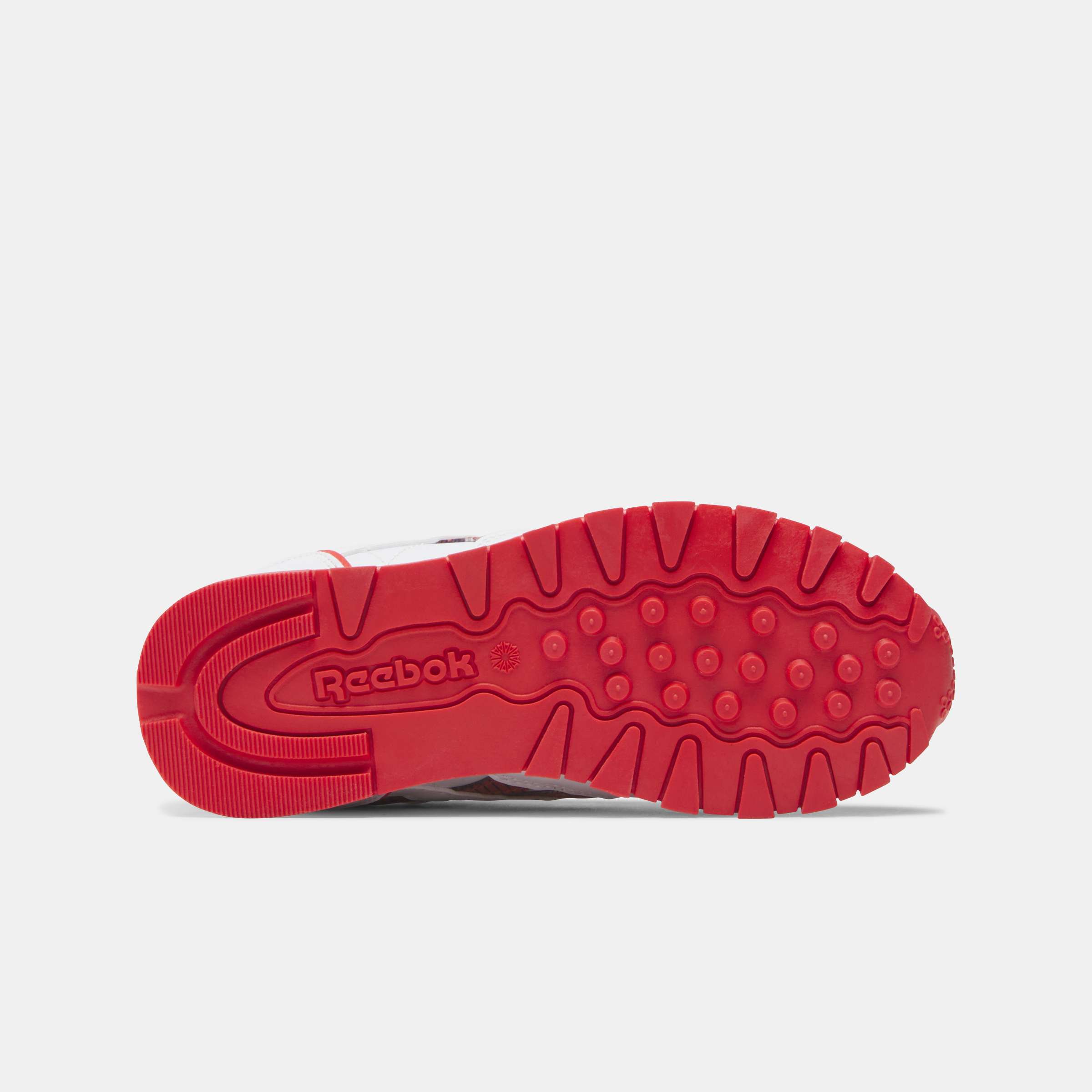 Los tenis Reebok para niños pequeños cuentan con colores y detalles divertidos, y tienen clips en el talón que se iluminan con cada paso. image number 5