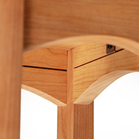 Detailed view of the underside construction of a solid wood end table.
