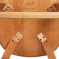 Detailed close-up image of a nightstand leg attachment.