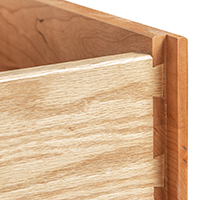 Detailed close-up image of a dovetail drawer joint.