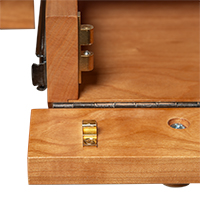 Detailed view of a soft-close keyboard tray drawer slide and mechanism.