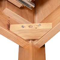 Detailed close-up image of a nightstand leg attachment.