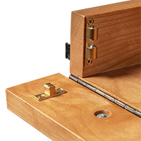 Detailed view of a soft-close keyboard tray drawer slide and mechanism.