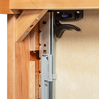 Detailed close-up image of a nightstand drawer slide mechanism.