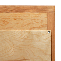 Detailed view of a case back construction showing plywood backing.