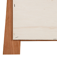 Detailed construction view of the back of a solid wood wall mirror.