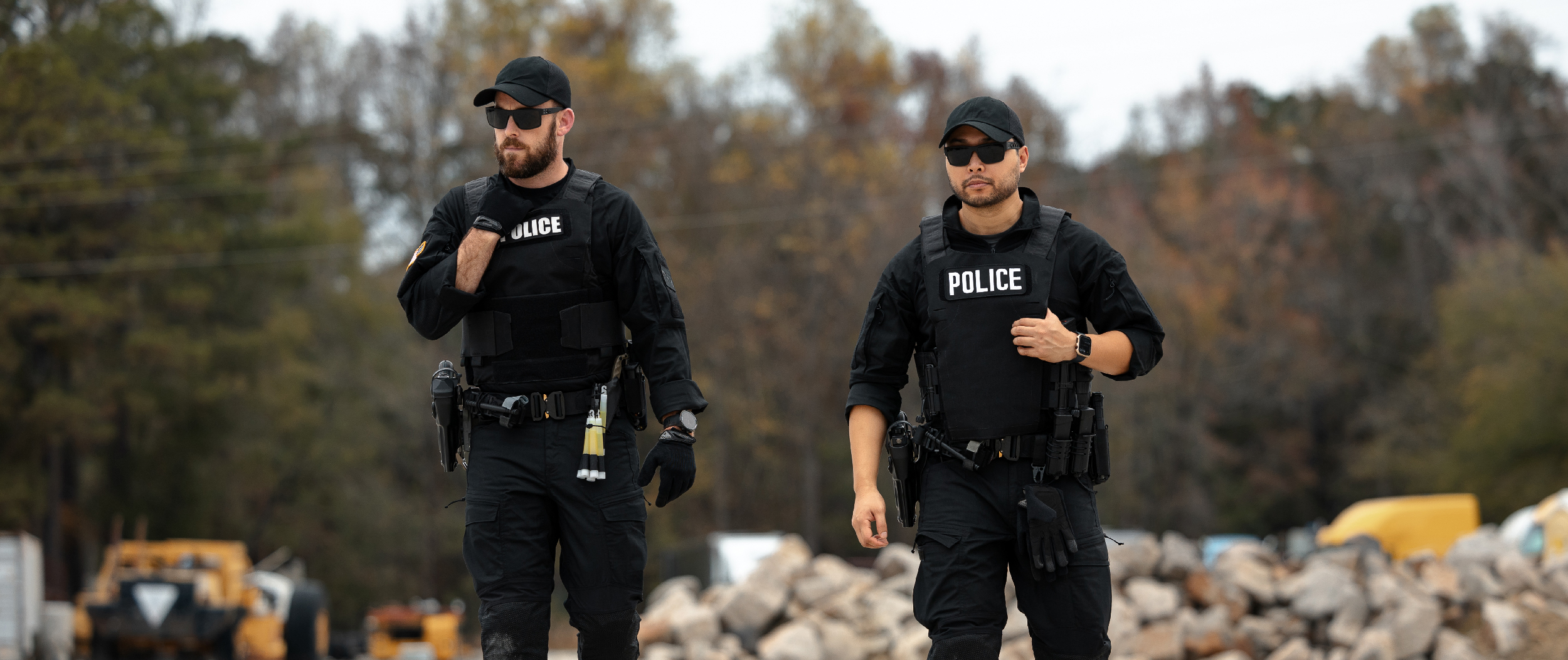 Image of two police officers walking in their lcs vanquish lt late carriers