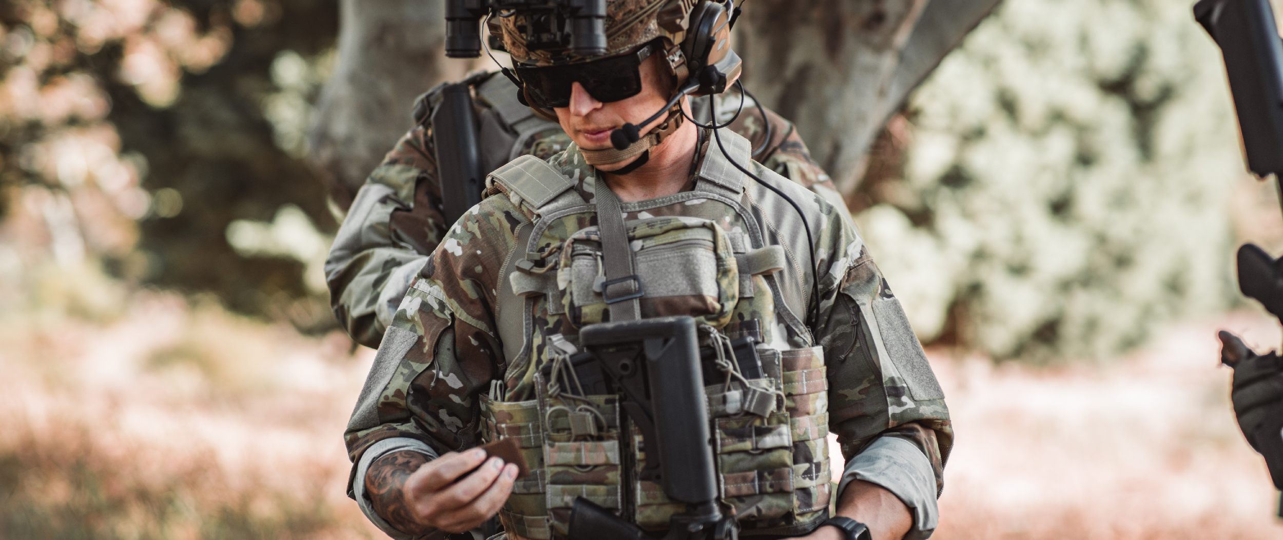 A US Marshal wearing a plate carrier with the compact utility pouch attached