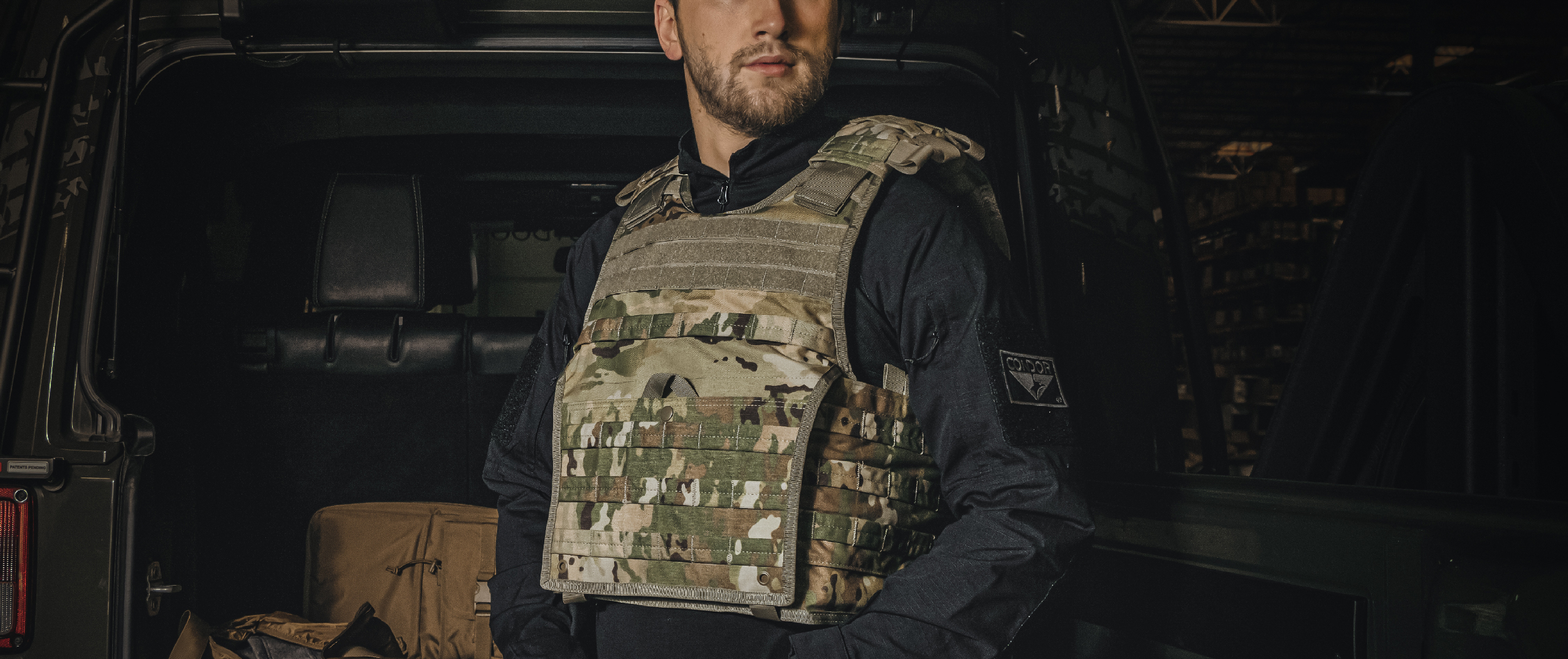 Image of someone wearing a multicam exo plate carrier.