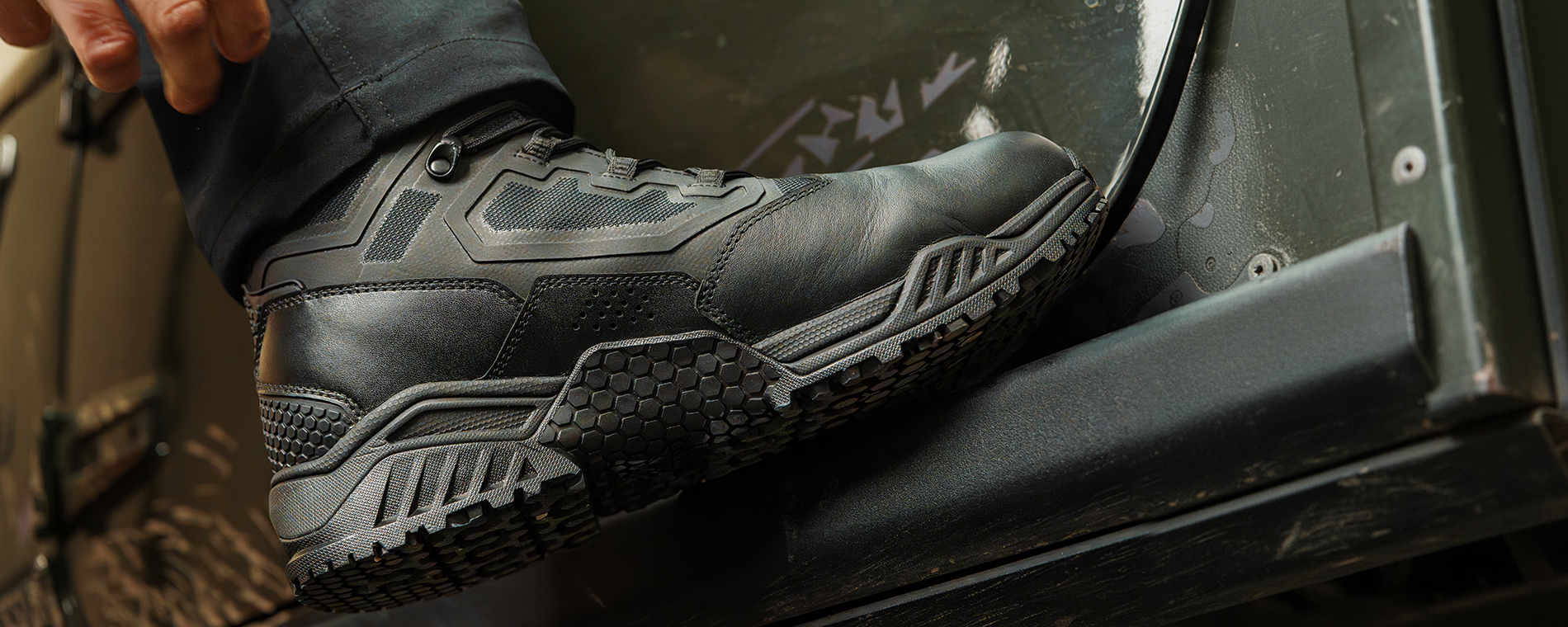 Image of someone adjusting their 6in brigade tactical boot in black