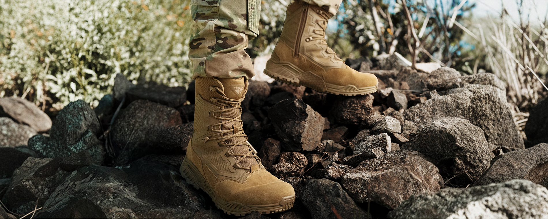 image of a soldier in the boots standing on a rock