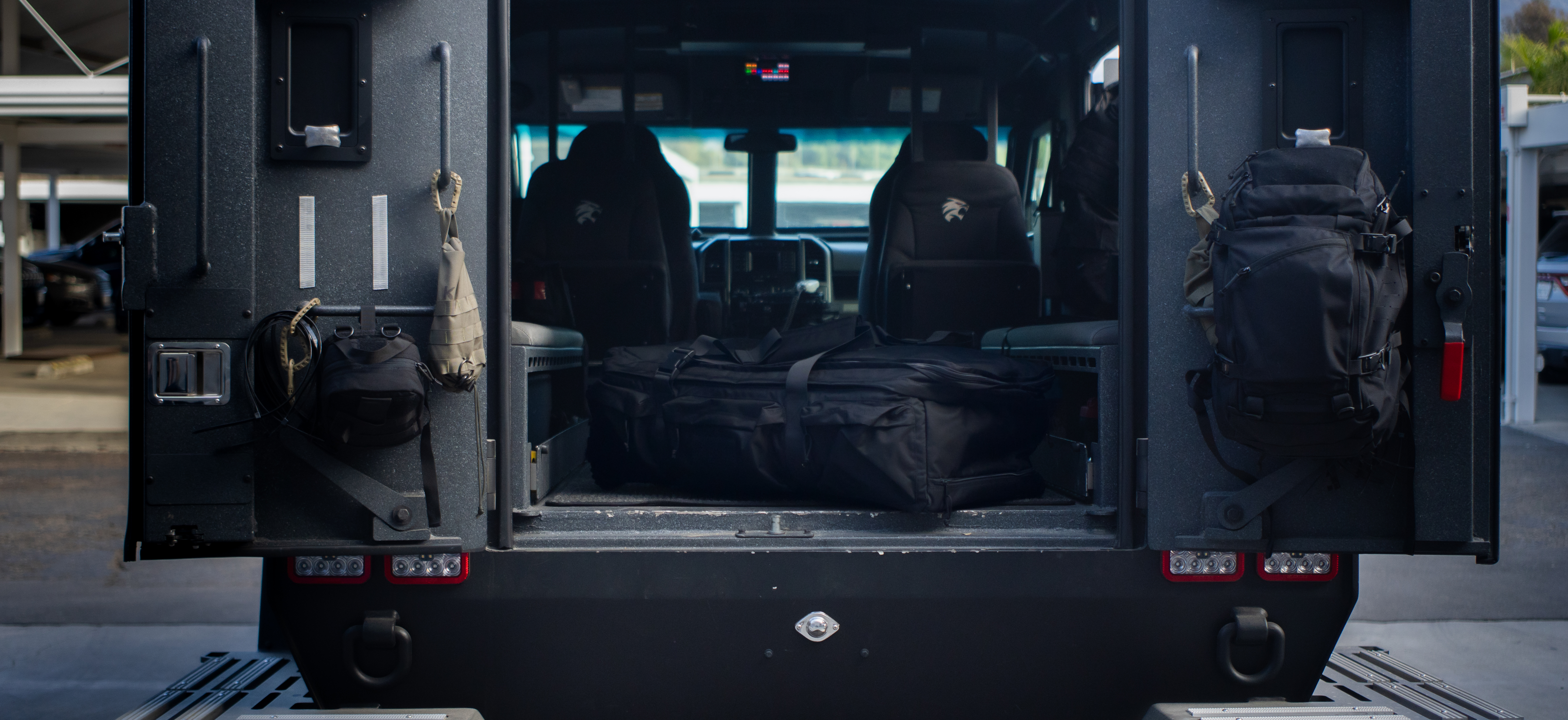 Image of a duffle in the back of a swat bearcat
