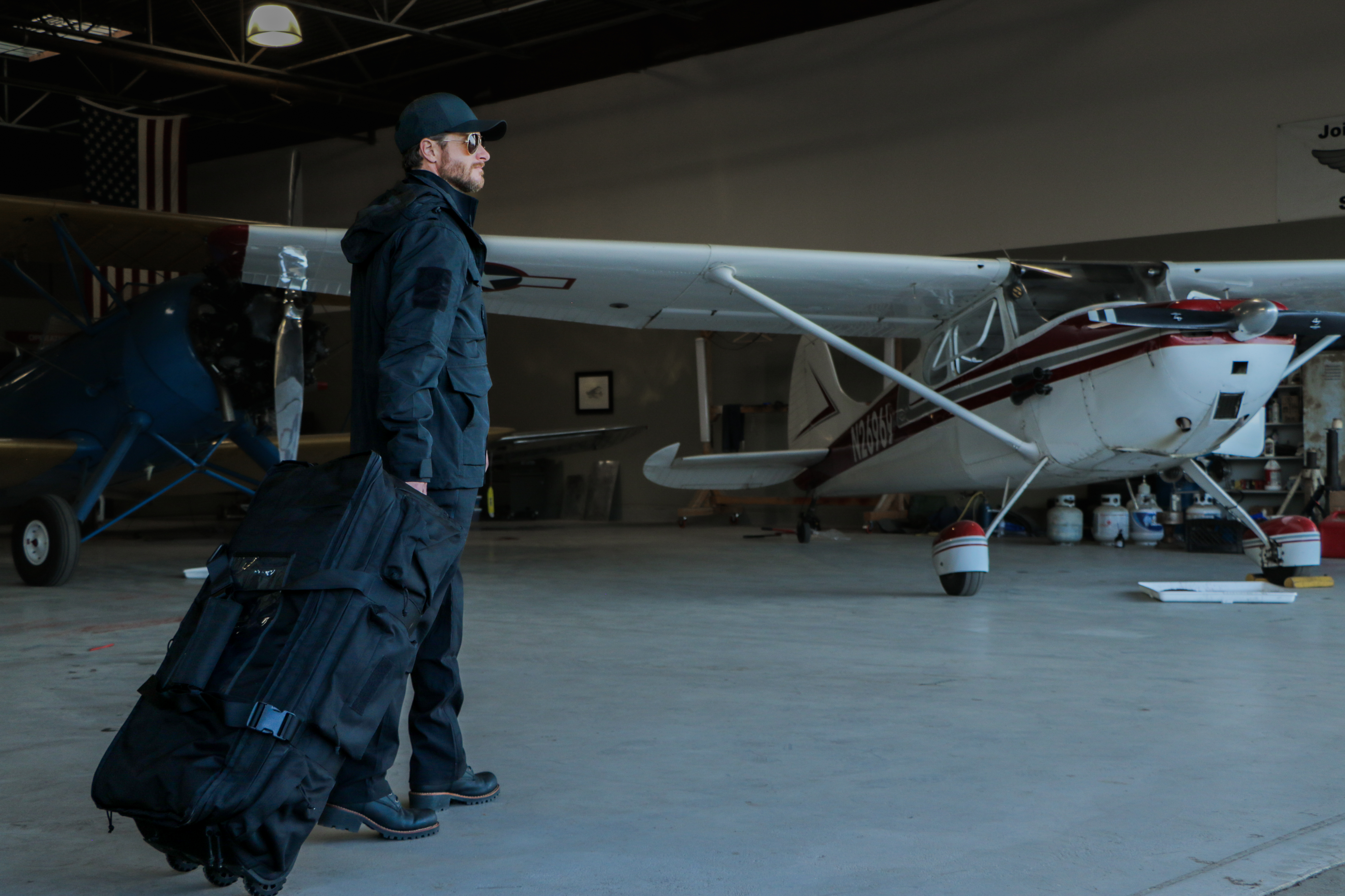 image of a person in the aegis parka in an airplane hanger