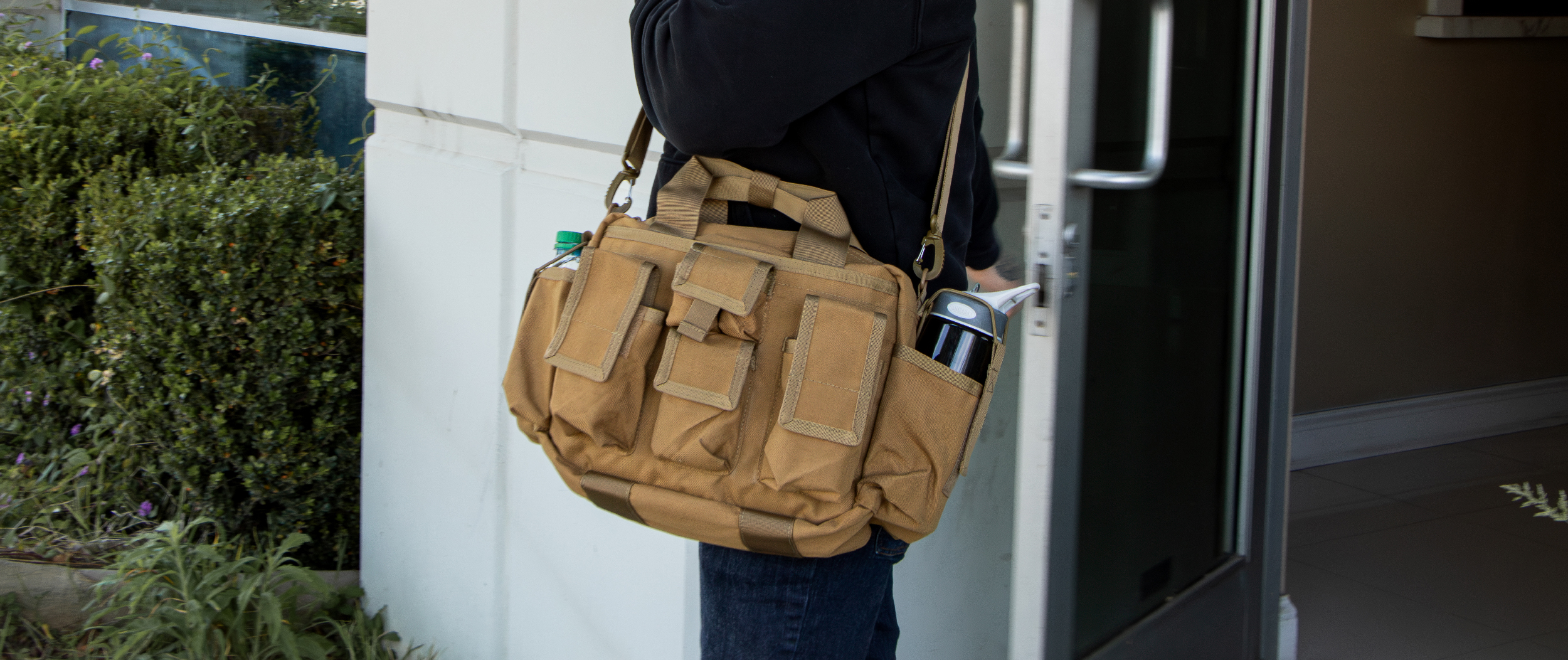 Image of someone walking with the tactical response bag.