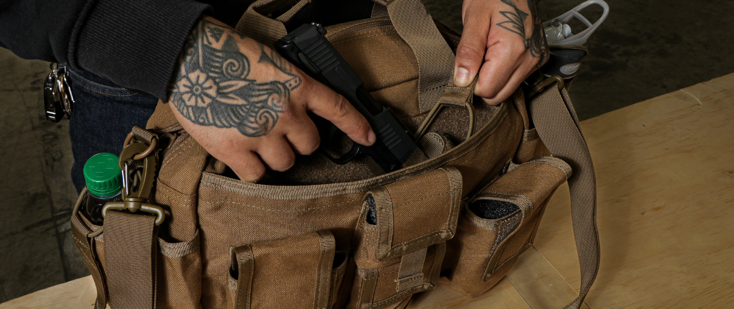 Image of someone pulling the concealed pistol out