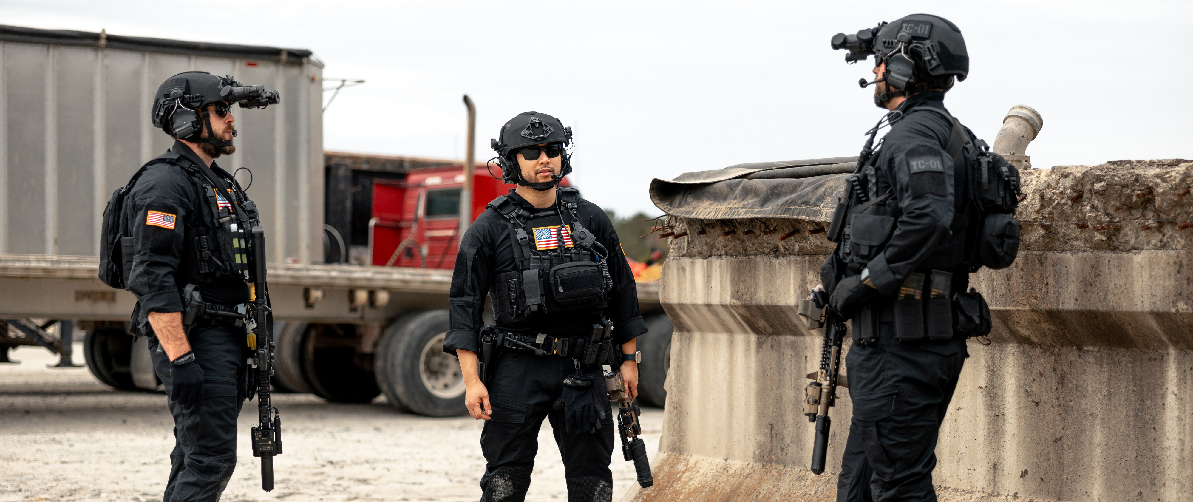 image of three officers in combat shirts relaxing