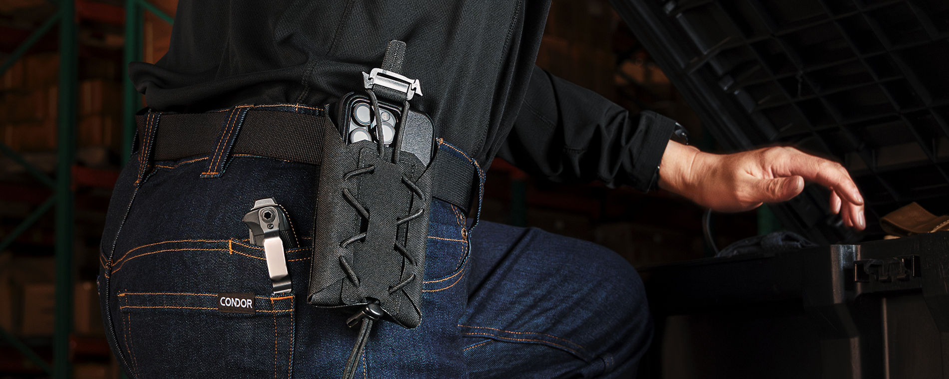 Image of the LACE Phone pouch mounted to someone's belt