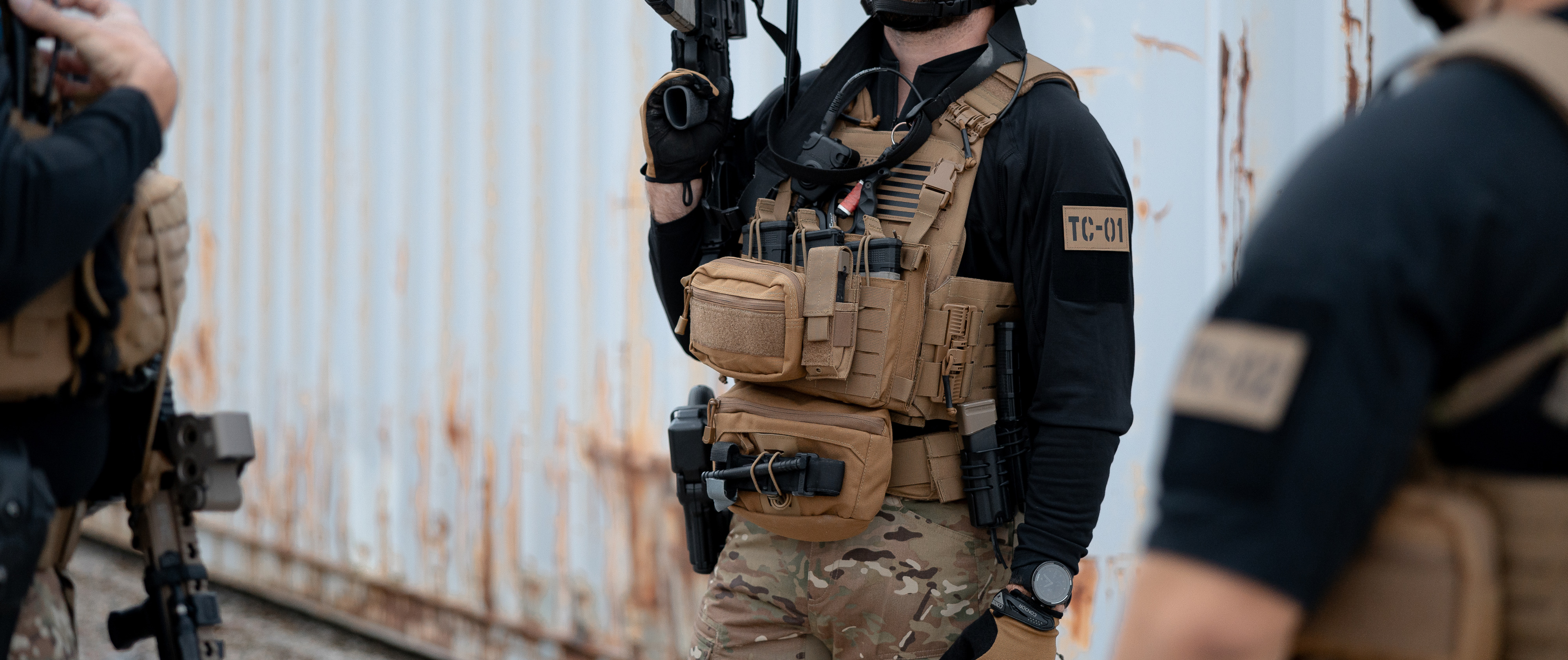 image of a man in full kit standing wearing a trident long sleeve battle top