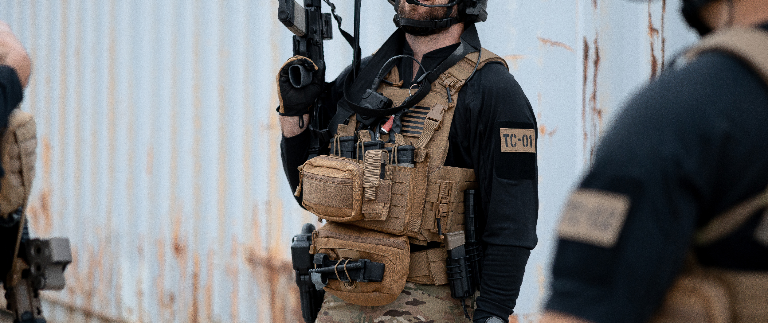 Image of the waist pack being used on a plate carrier with a tourniqueet attached to it