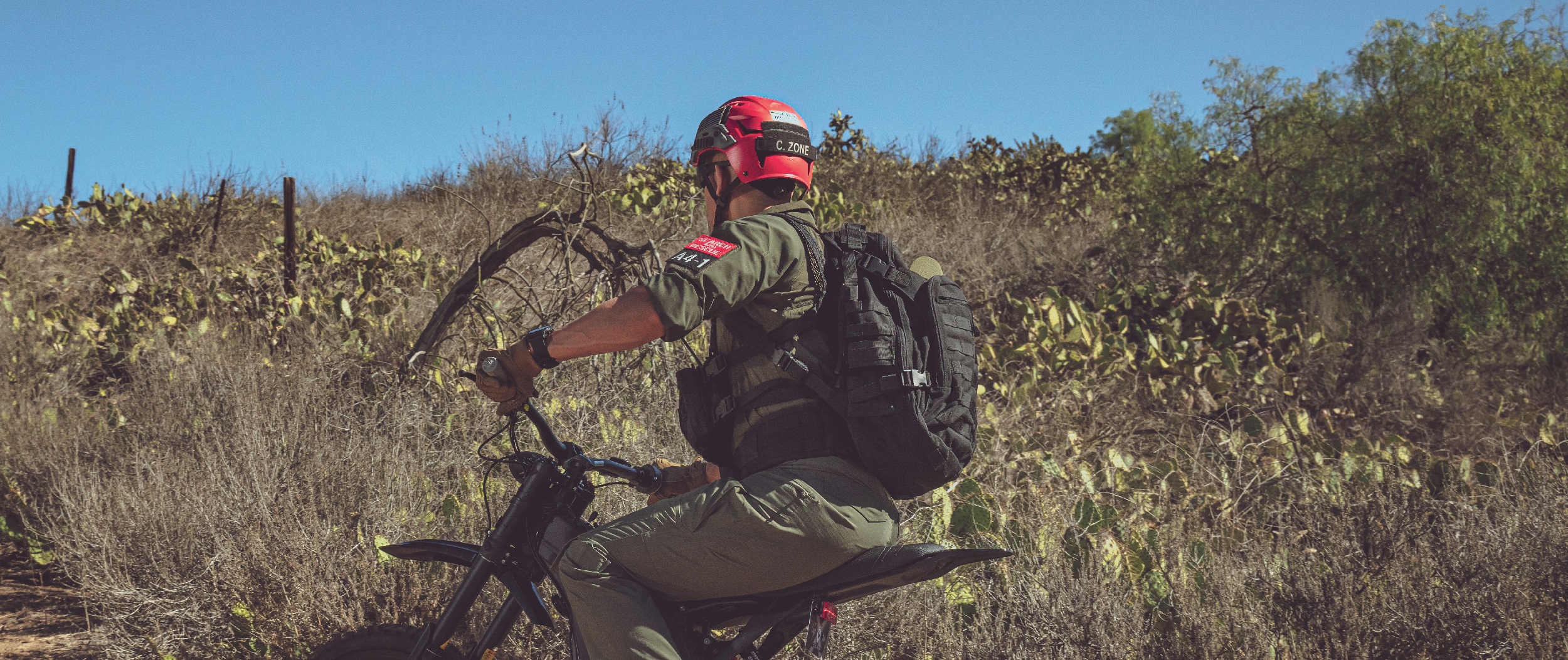 Image of someone on a motorcycle wearing the bag