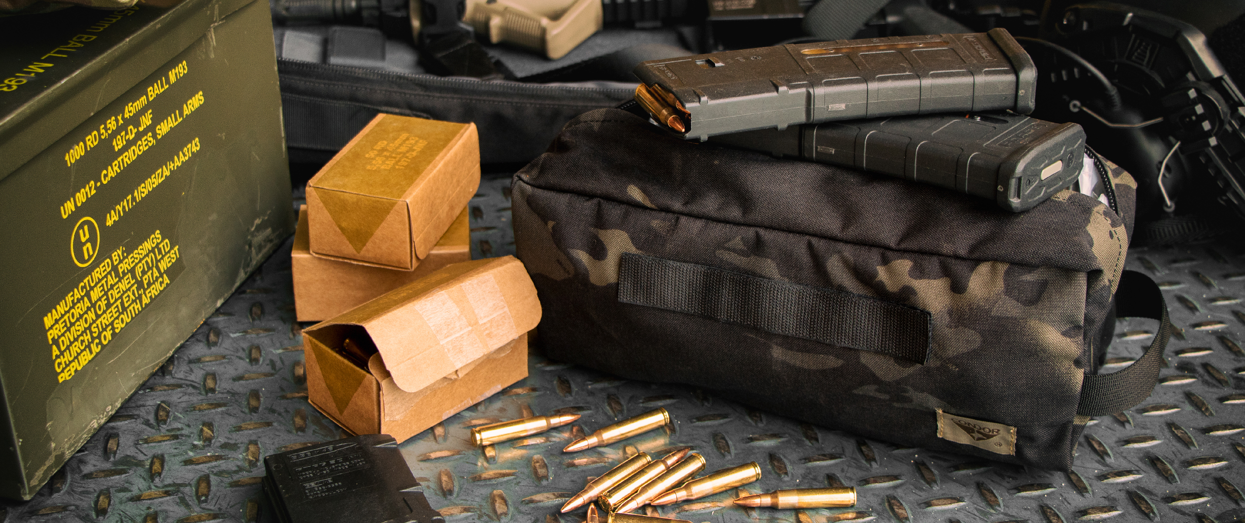 Image of a multicam black kit bag with AR magazines on top