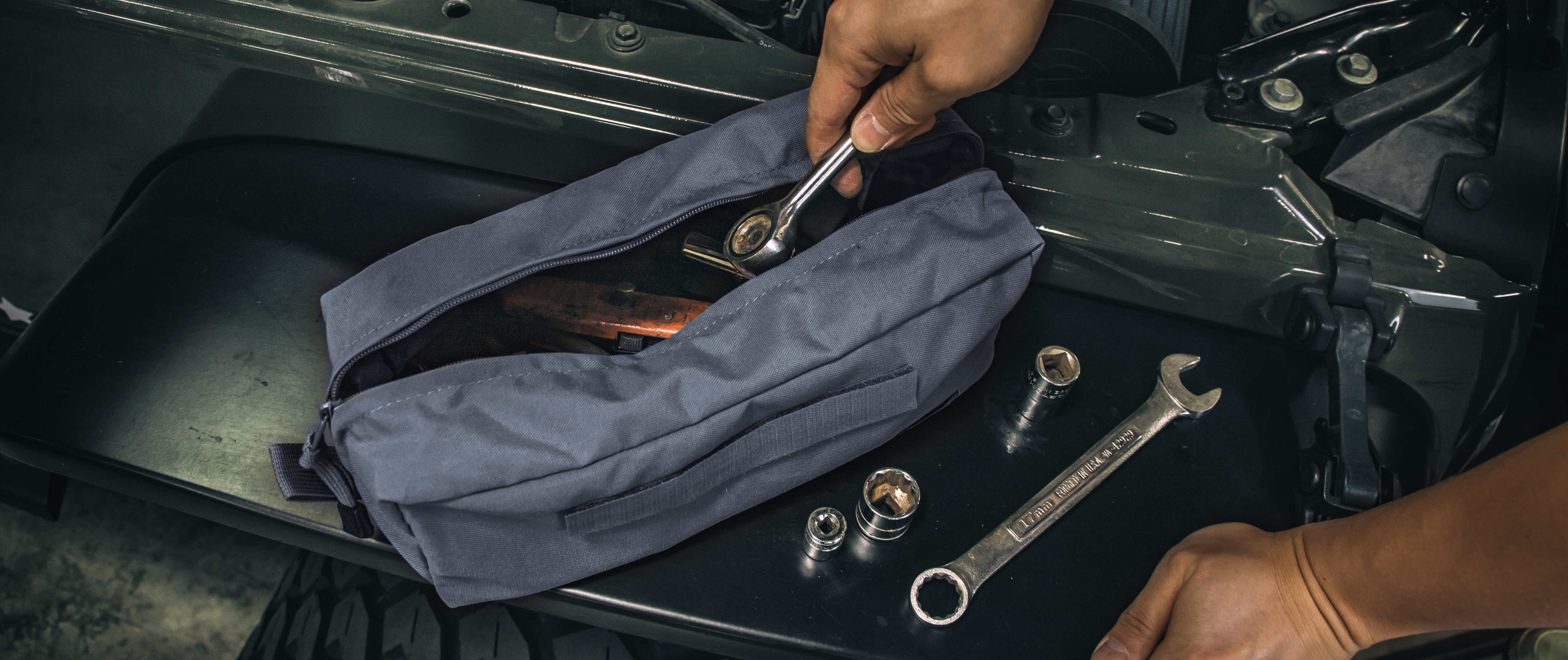 Image of tools going into the kit bag