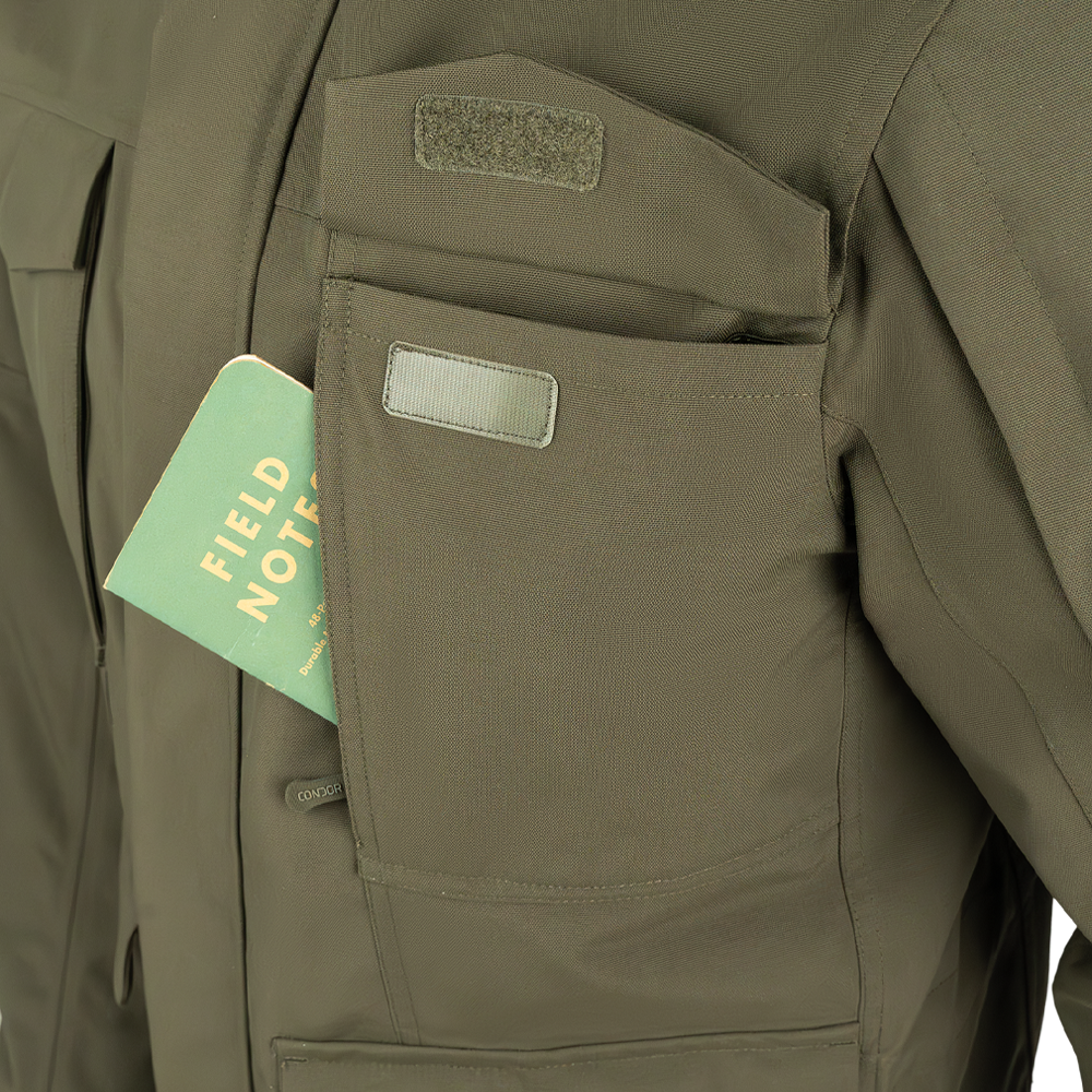 Image of some of the pocket features on the front of the waterproof parka