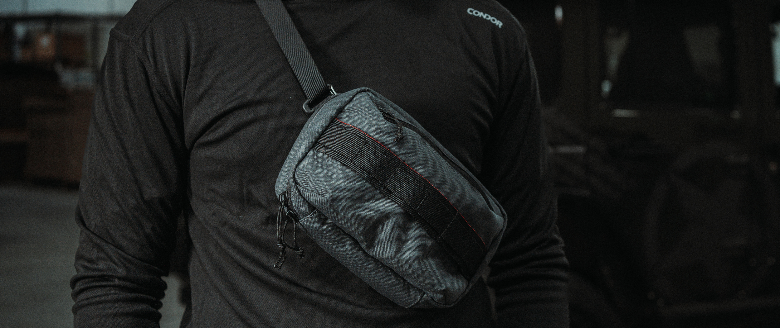 image of the tech pouch slung as a crossbody