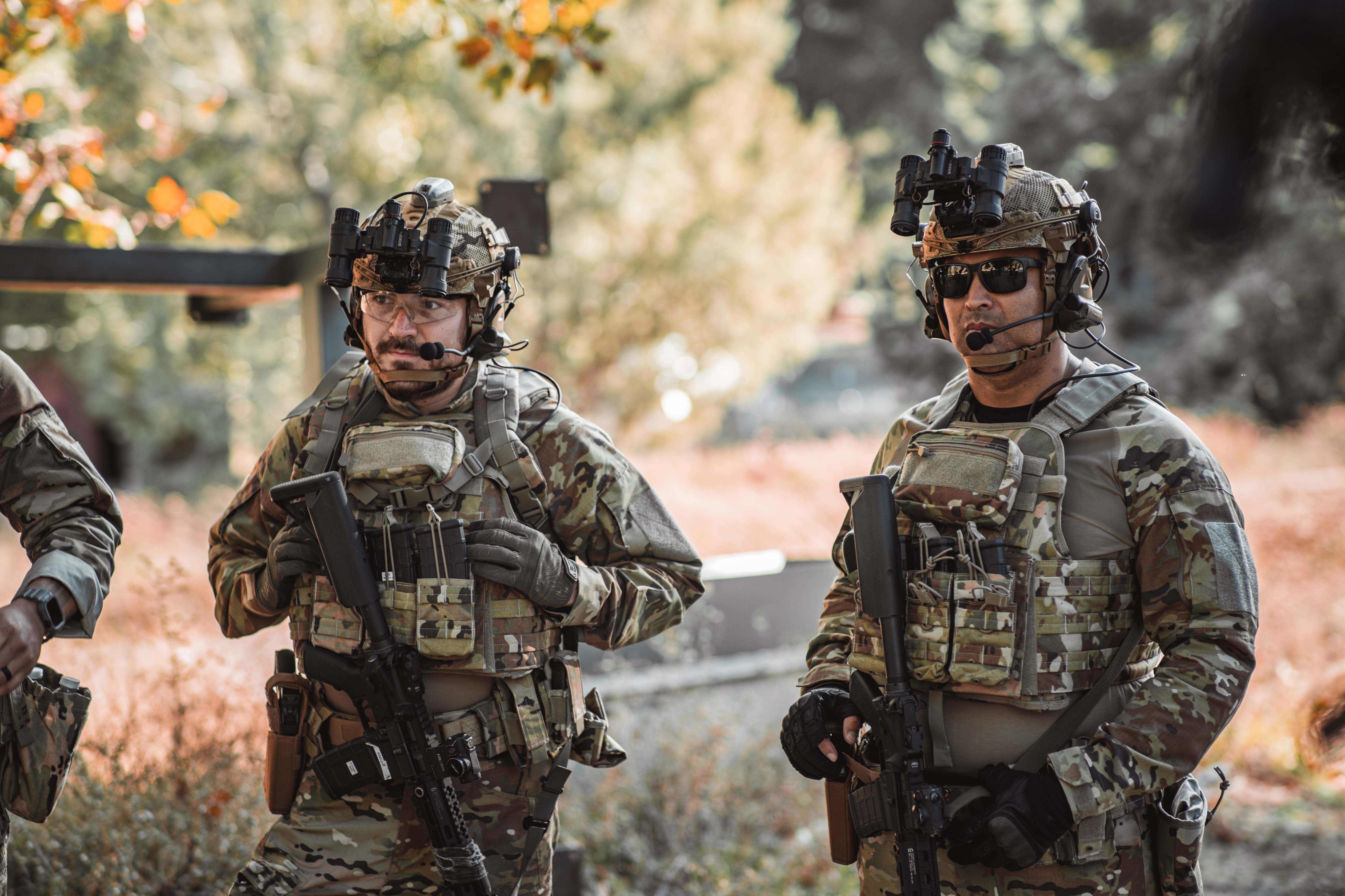 image of two marshals in multicam relaxed in posture, wearing a battle belt with a single pistol mage pouch on it