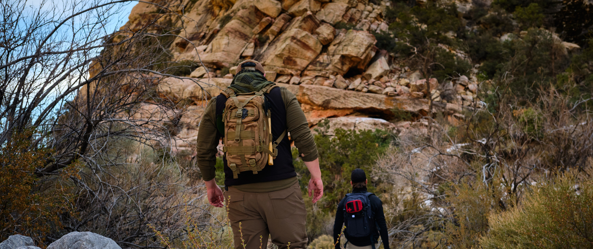 Image of a person on a  hike using the compact assault pack