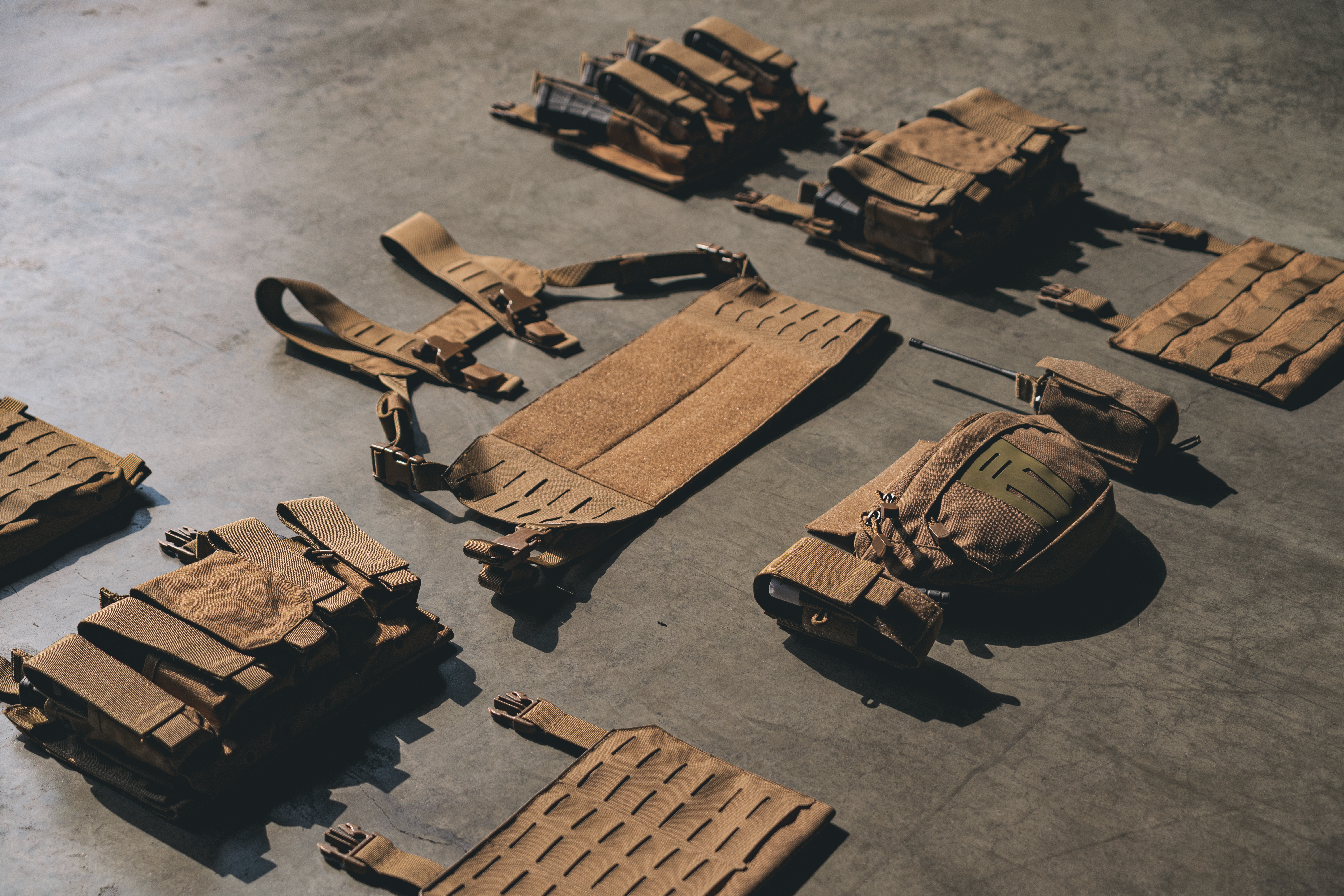 image of a person wearing the chest rig in a micro confid with a dangler pouch