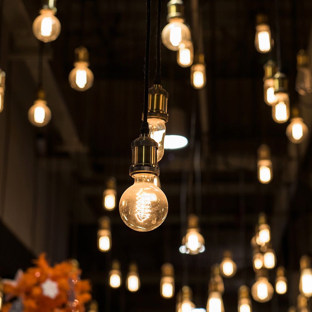 LED - 6W Filament E27 G125 Amber Glass 1800K