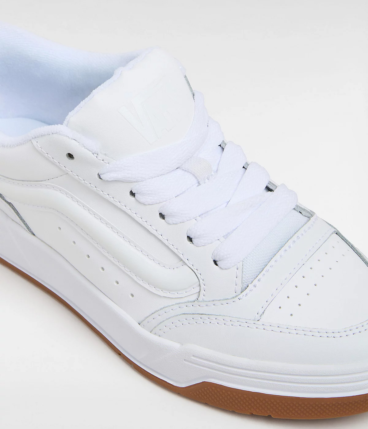 People wearing propose white vans