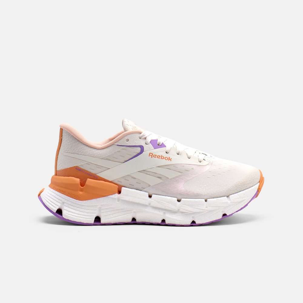 Los tenis Floatzig Symmetros Reebok con espuma Floatride Energy Foam que proporciona ligereza y retorno de energía.