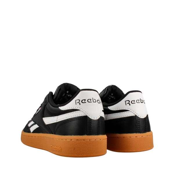 Tenis casuales inspirados en los años 80, con parte superior de cuero suave y rayas laterales de contraste. image number 4