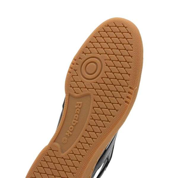 Tenis casuales inspirados en los años 80, con parte superior de cuero suave y rayas laterales de contraste. image number 6