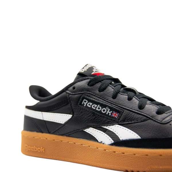 Tenis casuales inspirados en los años 80, con parte superior de cuero suave y rayas laterales de contraste. image number 8