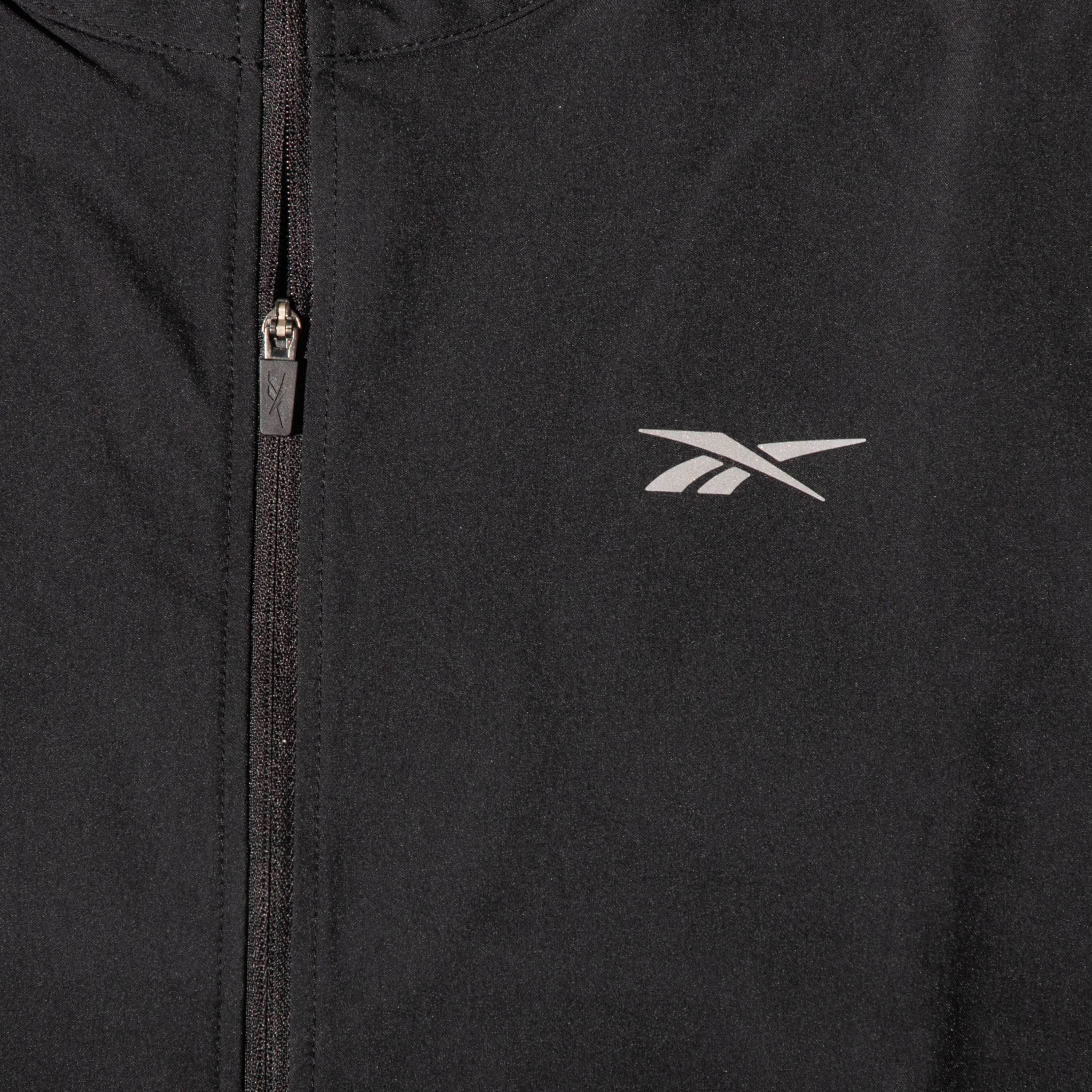 Chamarra running windbreaker en corte cropped