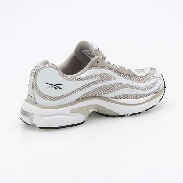 Tenis Premier Pump Paris Trainer Inspirados en diseños de running de los 2000, cuentan con un tobillo acolchado y tecnología de sujeción personalizada de Reebok.