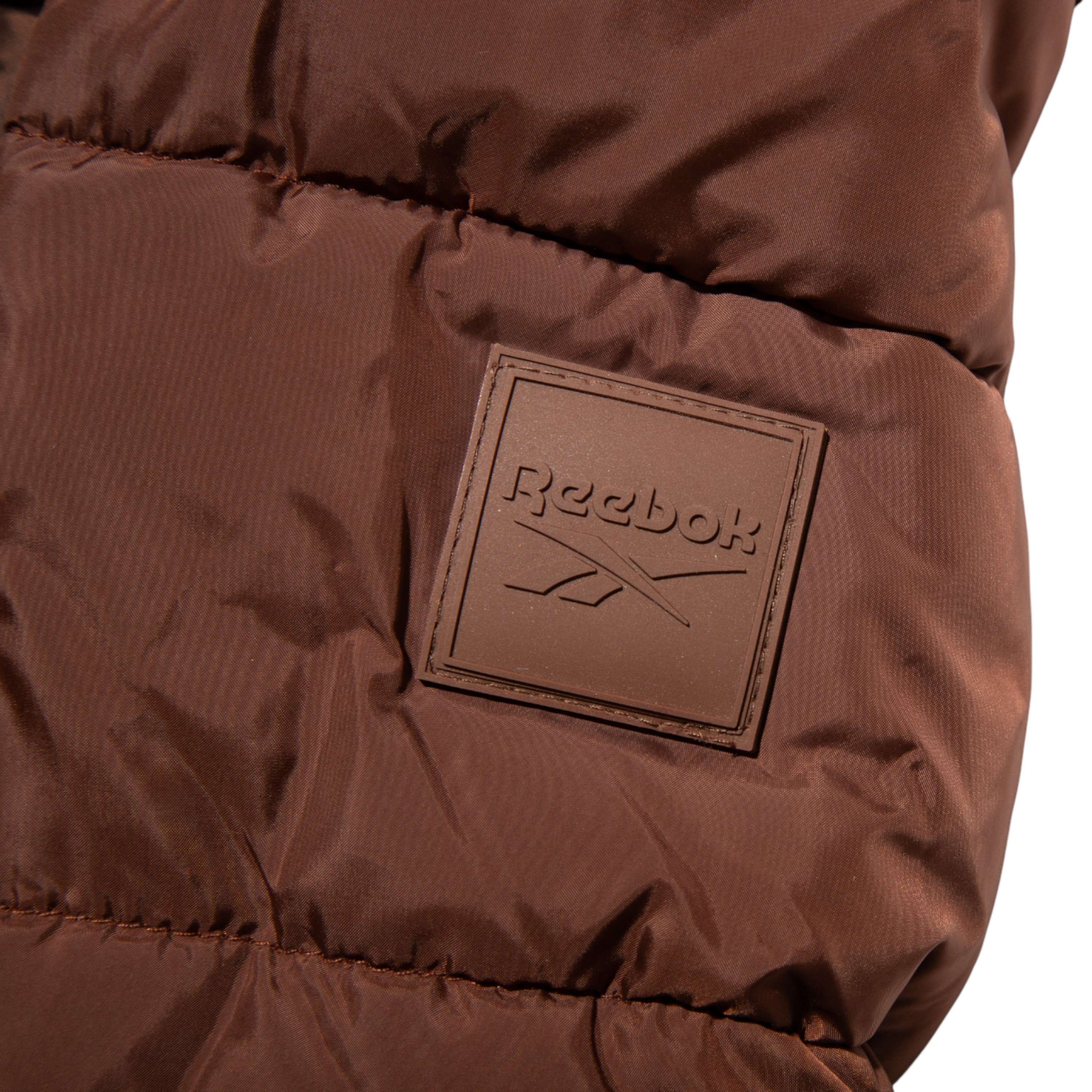 Chamarra puffer reversible con forro de piel sintética image number 3